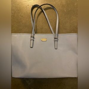 Michael Kors tote bag. Great for work/travel. Can hold laptop